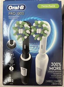 Oral B Pro 1000 Cross Action Black & White Toothbrush - 2pk SEE DETAILS