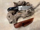 Large  Damascus Hunting knife w/ black horn stocks in handmade leather sheath