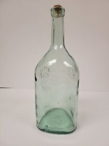 Vintage Bottle With Impressed Suns Smiling Large