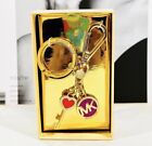 Michael Kors gold tone purse charm keychain charm