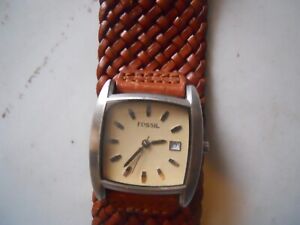 Fossil women's wide brown leather band.quartz,battery & water resistant watch.