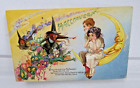 Vintage Embossed Halloween Postcard w/ Witches, Goblins &Father Daughter on Moon