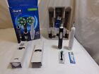 ORAL-B PRO 1000 TWIN PACK RECHARGEABLE TOOTHBRUSHES BLACK & WHITE .. WORKING!!!