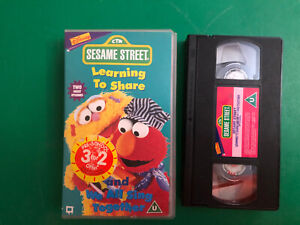 Sesame Street: Learning To Share/We All Sing Together [VHS] [VHS Tape]