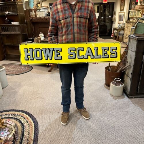 Vintage Howe Scales Advertising Yellow Porcelain Enamel Sign