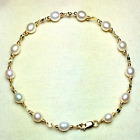14k solid yel/gold natural freshwater white Pearl bracelet 6 1/2'' lobster claw