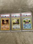 Lot Of 3. PSA 7 cards 1st First Edition Shadowless Magmar Rattata Squirtle