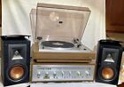 vintage stereo system with turntable, speakers and reciever