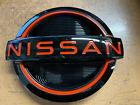 NEW OEM 2022-2024 NISSAN FRONTIER FRONT GRILLE EMBLEM - RED ACCENT (For: 2022 Nissan Frontier)