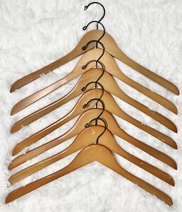 Lot of 7 light wood shirt/coat hangers with black hooks
