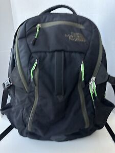 The North Face Surge Backpack Black and Forest Green