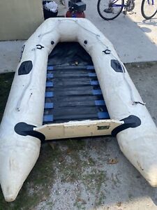 Zodiac Inflatable 10foot Raft Boat with wood Floor France holds air, water leaks