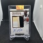 2017-2018 Panini National Treasures Khris Middleton Patch Auto /25 4 Color Patch