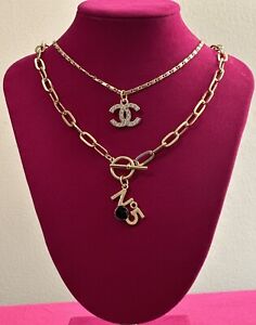 Set Of  Two  CHANEL charm necklaces-STACK!!