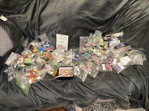 Large lot of flatback beads assorted sizes, shapes, and Colors.