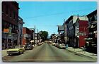 Muncy Pennsylvania~Main Street~Hershey Ice Cream~Cars~1950s Postcard