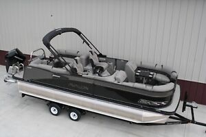 New 23  ft. pontoon boat with 250 Hp Mercury and dual bunk trailer