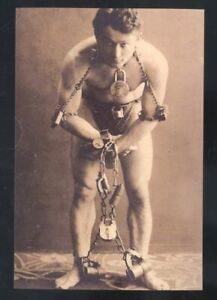 REAL PHOTO HARRY HOUDINA ESCAPE ARTIST IN CHAINS MAGICIAN POSTCARD COPY