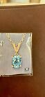 Levian Blue Topaz And 14k Strawberry Gold Over Silver Pendant