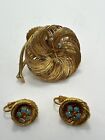 Vintage Gold Tone Wired Rhinestone Flower Brooch & Clip Earrings blue stones