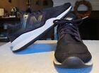 New Balance 247 womens Size 7 black and white running shoes
