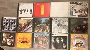 New ListingThe Beatles CD LOT OF 14 Revolver Help With The 1 Love Abbey Road White Album +