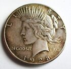 1928 PEACE SILVER DOLLAR. RAW, CIRCULATED, UNCERTIFIED. BETTER GRADE.