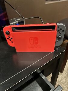 New ListingNintendo Switch OLED: Mario Red Special Edition  With Two Games