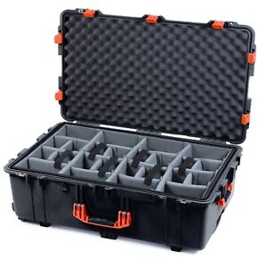 Black & Orange Pelican 1650 case. Comes with grey CVPKG dividers & wheels.