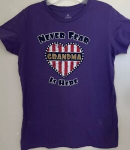 NEVER FEAR GRANDMA IS HERE Tee Shirt USA Flag Heart Purple Woman’s Size M.