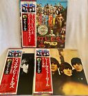 BEATLES - A LOT OF THREE BEATLES TITLES ON THE JAPANESE EAS FLAG SERIES WITH OBI
