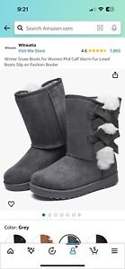 Woman’s snow boots/ brand new size 9 gray / never worn only tried on
