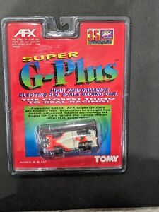 NEW IN THE PACKAGE TOMY AFX SUPER G PLUS SHELL MCLAREN HO SCALE SLOT CAR