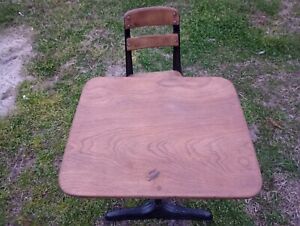 vintage wooden schooldesk with attached chair