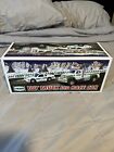 Hess 2011 Toy Truck with Ramp and Race Car Lights and Sound New in Box