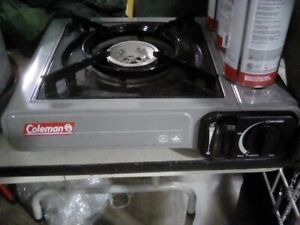 New Coleman 1 Burner Butane Camping Stove with 3 cans of propane fuel