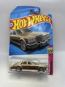 2023 Hot Wheels '82 Cadillac Seville  D Case, brown. 75/250