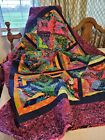 Hand made lap quilt- blocks on point of bright multi colored batiks.