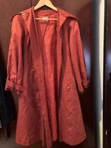 Long, red vintage army trench coat. Size Small Women's, with quilted lining.