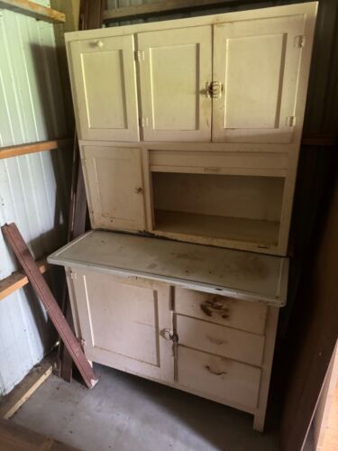 vintage hoosier cabinet with flour sifter