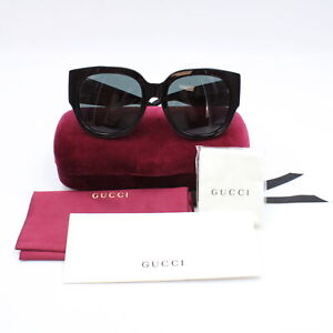 Gucci GG0141SN Oversized Frame Sunglasses in Black, Black Lenses & Gold Hardware