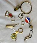 Six vintage novelty keychains: bottle openers, whistles, Detroit Lions, Pepsi,