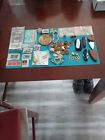 junk drawer lot Coins,stamps,cards,knives,medallion, Rings,earrings,broaches,etc