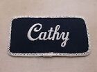 CATHY USED EMBROIDERED VINTAGE SEW ON NAME PATCH TAGS WHITE ON DARK BLUE