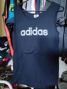 Vintage 80s Adidas spell out summer navy blue tank top made in usa shirt