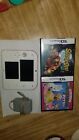 NINTENDO 3DS WITH 2 GAMES AND CHARGER!!..