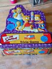 The Simpsons Trivia Game Collectors Tin with Cast Poster, from 2000.