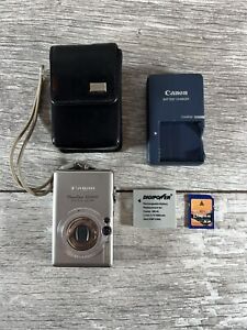 Canon PowerShot ELPH SD600 6MP Digital Camera Silver 4x Zoom Battery & Charger