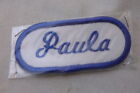 PAULA  USED EMBROIDERED VINTAGE SEW ON NAME PATCH TAGS OVAL BLUE ON WHITE