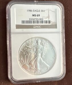 1986 1oz Silver Eagle S$1 NGC MS69 Classic Brown Label First Year Issue.